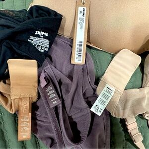 36B SKIMS bras